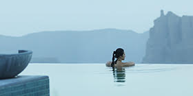 Person in swimming pool, Hajar Mountains, Oman