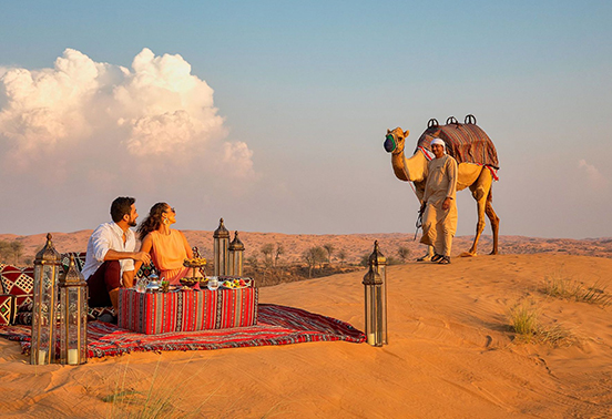 Two people having aDesert picnic