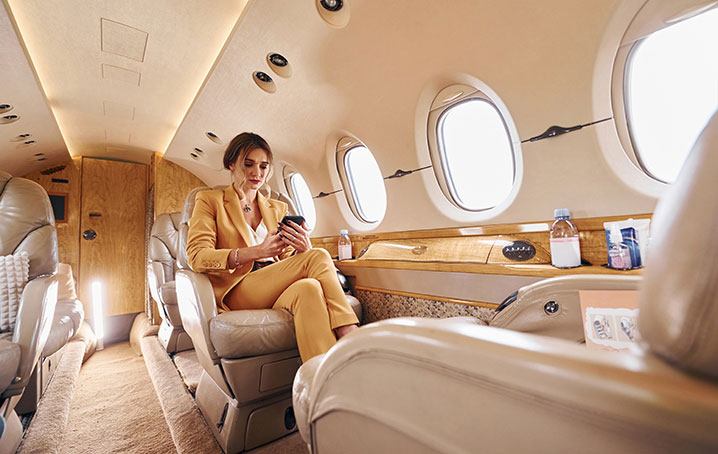 Person sitting on a private jet